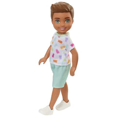 Barbie Chelsea 6 Inch Brunette Boy Doll Wearing Colorful Printed T-Shirt, Blue Shorts & White Shoes for Kids Ages 3 Years Old & Up