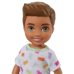 Barbie Chelsea 6 Inch Brunette Boy Doll Wearing Colorful Printed T-Shirt, Blue Shorts & White Shoes for Kids Ages 3 Years Old & Up