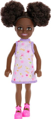 Barbie Chelsea Doll, Small Doll Wearing Removable Purple Floral Dress & Pink Shoes with Space Buns & Brown Eyes