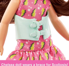 Barbie Chelsea 6 Inch Doll Brunette with Brace Wearing Pink Lightning Bolt Dress for Kids Ages 3 Years Old & Up