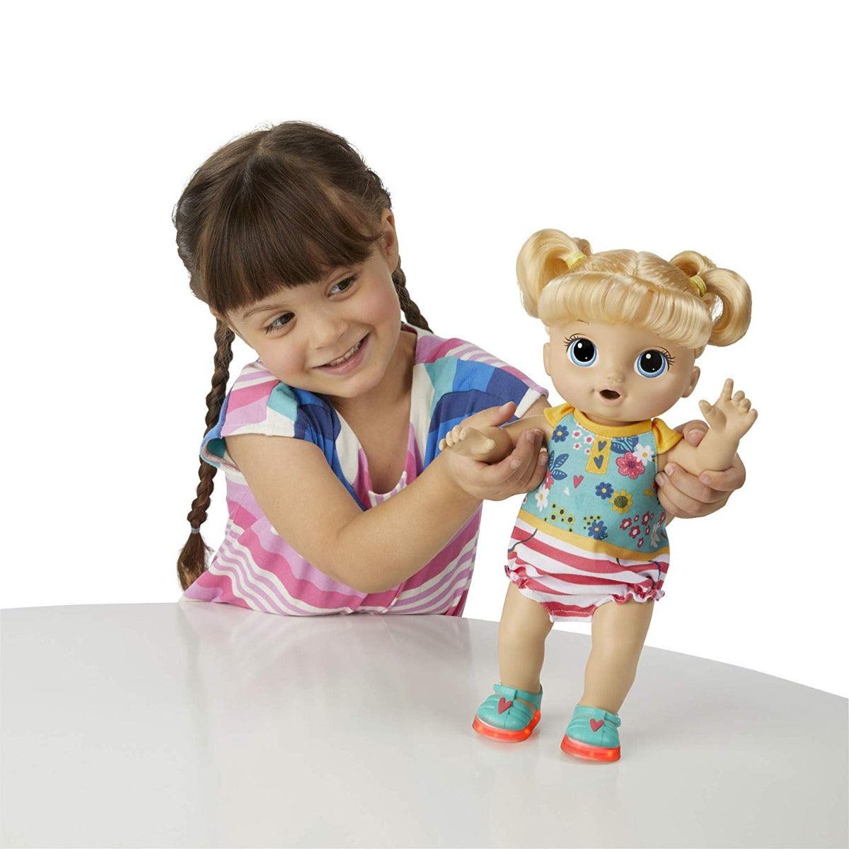 Baby Alive Step ‚Äö√Ñ√≤n Giggle Baby Blonde Hair Doll with Light-up Shoes, Responds with 25+ Sounds and Phrases, Drinks and Wets